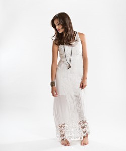 Pearl Pumphrey’s Contrasting styles of luxurious Italian lace make this maxi dress a stand-out piece for day-to-night summer looks. Accessorize with layered bracelets and a long, beaded necklace.