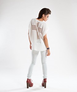 Maison Couture Clothiers Rock out in this cut-out cross shirt form Maison Couture Clothiers. Paired with a striped denim pant and woven red shoe, this look is a show-stopper.