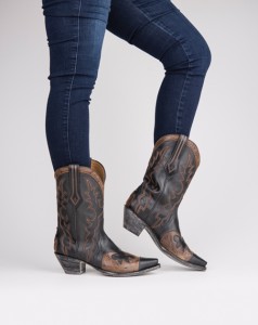 Salt & Pepper  These cowgirl boots are a great pick for any wardrobe. Featuring black and tan leather with feminine details, these boots are a must-have for fall.