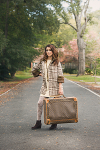 SALT & PEPPER ACCESSORY  BOUTIQUE This look has it in the bag - from the precious houndstooth jacket with fur cuff detailing to the impeccable cream-colored sweater dress, it’s an outfit perfect for holiday gatherings. Style it with a fun legging, multi-strand necklace with charm accents and a cute chocolate-colored wedge.