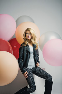 MAISON COUTURE CLOTHIERS Feminine and edgy, this moto jacket pays homage to a classic biker jacket with a boho flair.  Stay on trend with these leggings featuring silvery tapestry fused on custom ponte fabric.