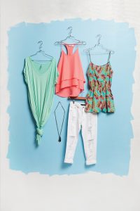 BEEHIVE We love this color palette for summer. This gorgeous coral, ruffled top is paired with a white distressed jean. Or change this look up by wearing the mint maxi or floral romper. This tassel necklace complements all these looks. 