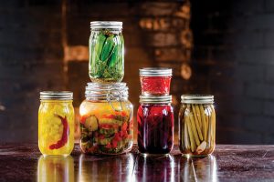 Karen E. Segrave P. Allen Smith and Bonnie Plants. Preserving Your Harvest. A variety of pickled vegetables: From left: cauliflower, pickles, okra (top), beets and green beans.